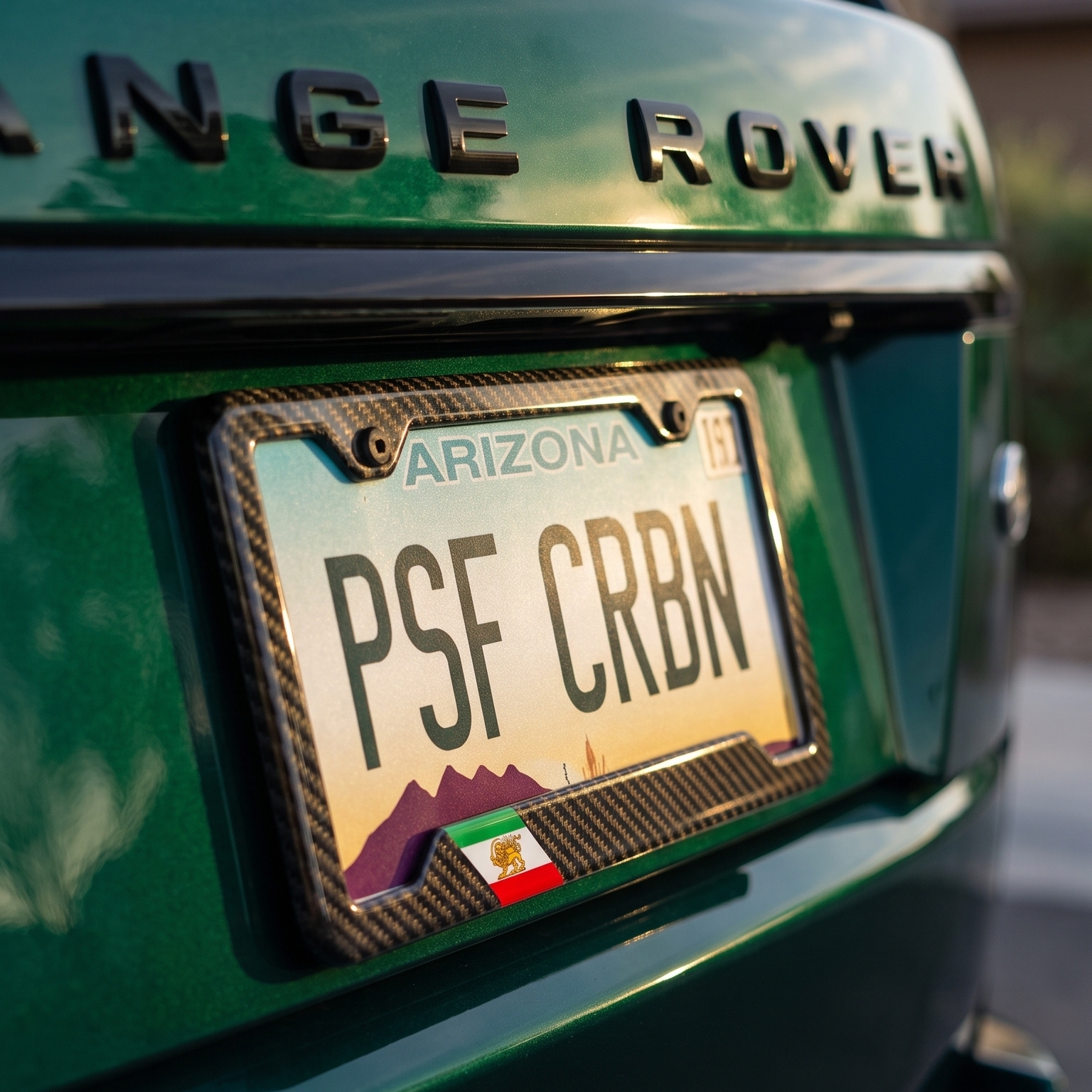 Iran flag carbon fiber license plate frame on Range Rover, three-quarter angle, Arizona plate PSF CRBN