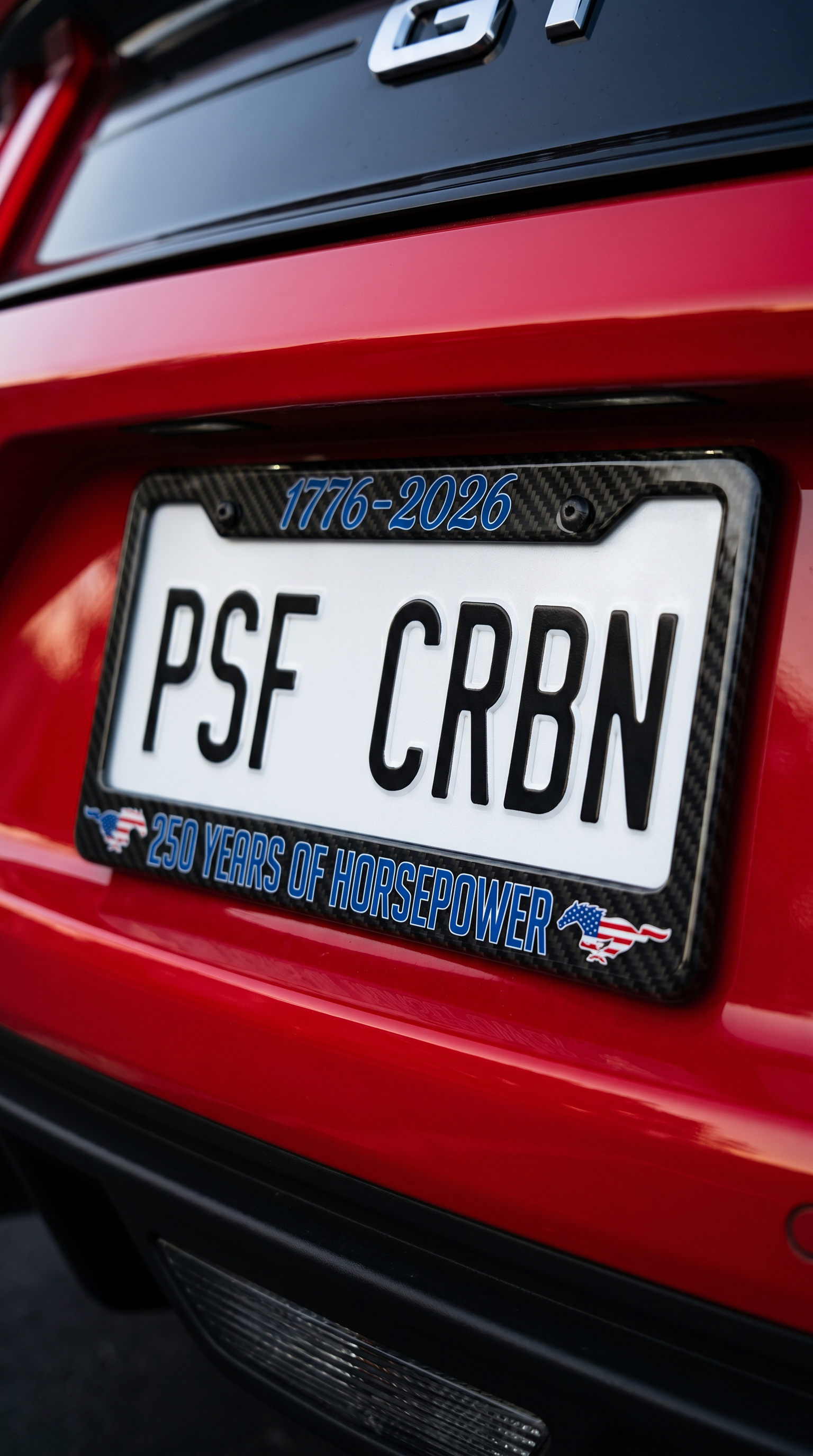 250 Years of Horsepower carbon fiber plate frame on a red Ford Mustang GT