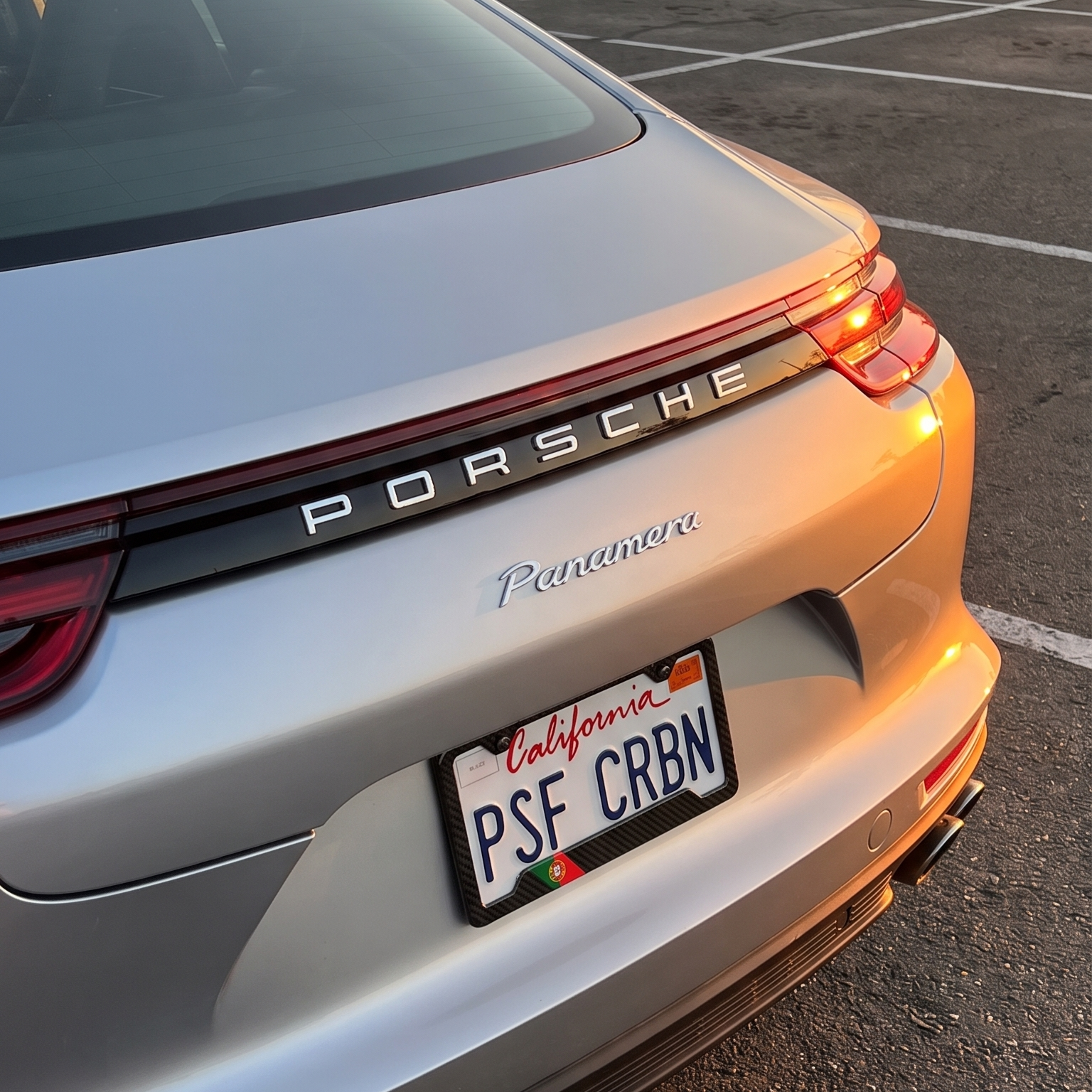 Portugal flag carbon fiber license plate frame on Porsche Panamera, California plate PSF CRBN