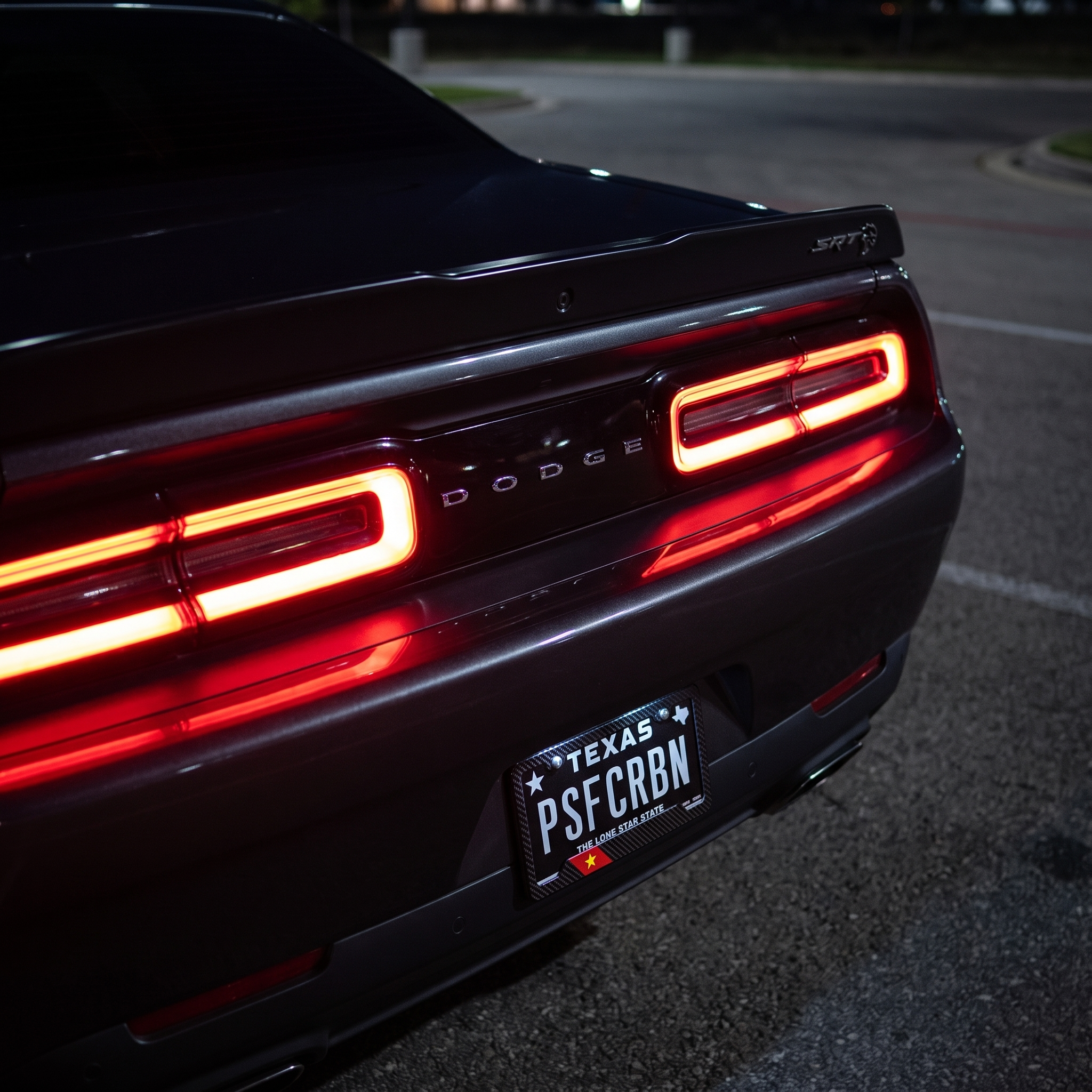 Vietnam flag carbon fiber license plate frame on Dodge Challenger SRT Hellcat at night