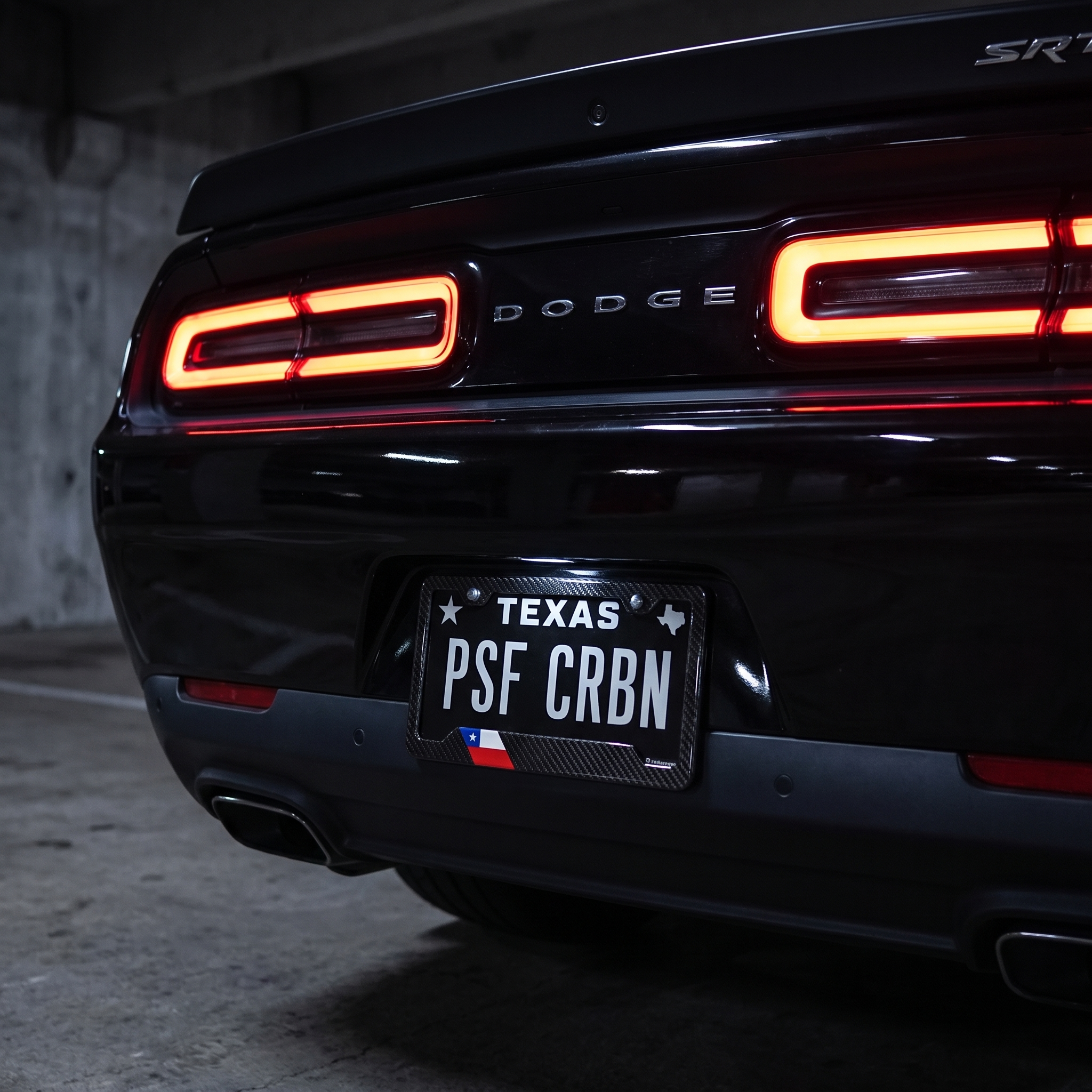 Chile flag carbon fiber license plate frame — on-car night hero, Challenger Hellcat