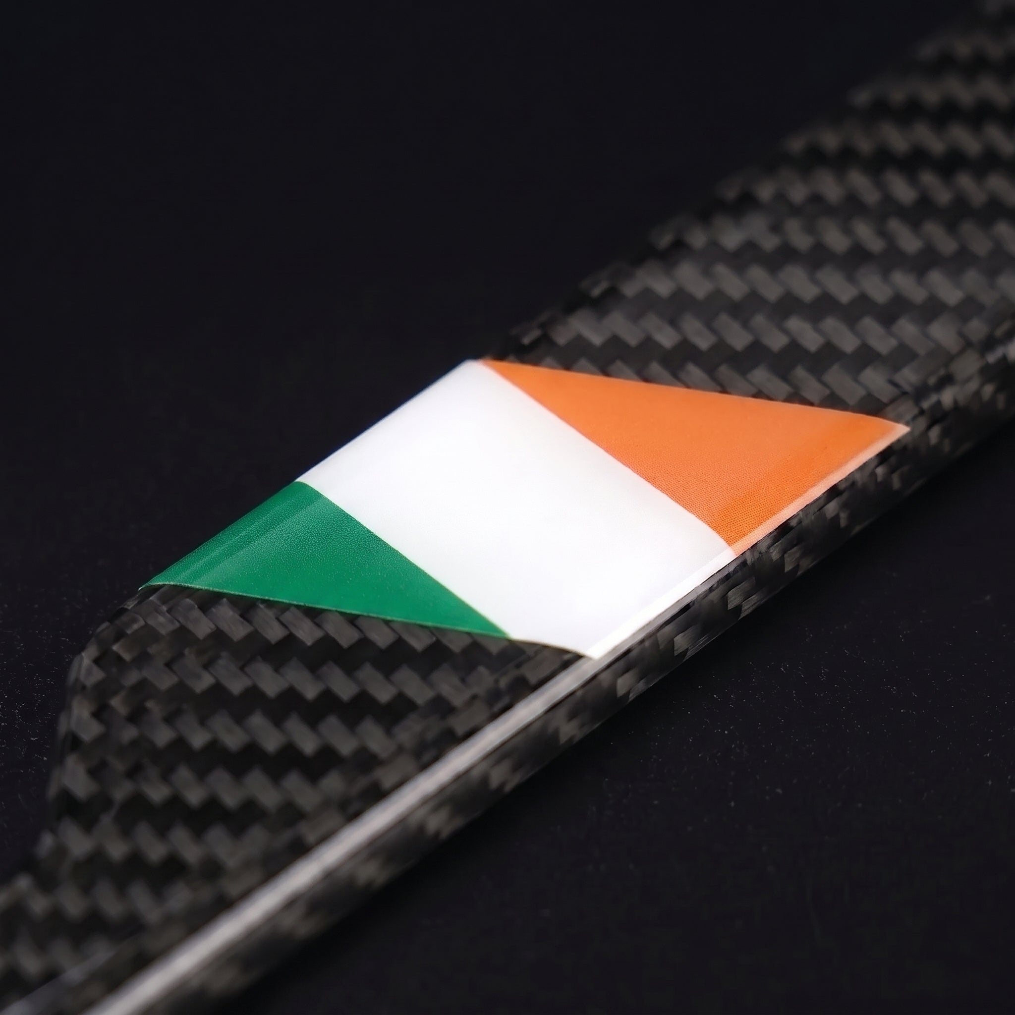 Macro of the Ireland flag inlay on a PSF Carbon carbon fiber license plate frame
