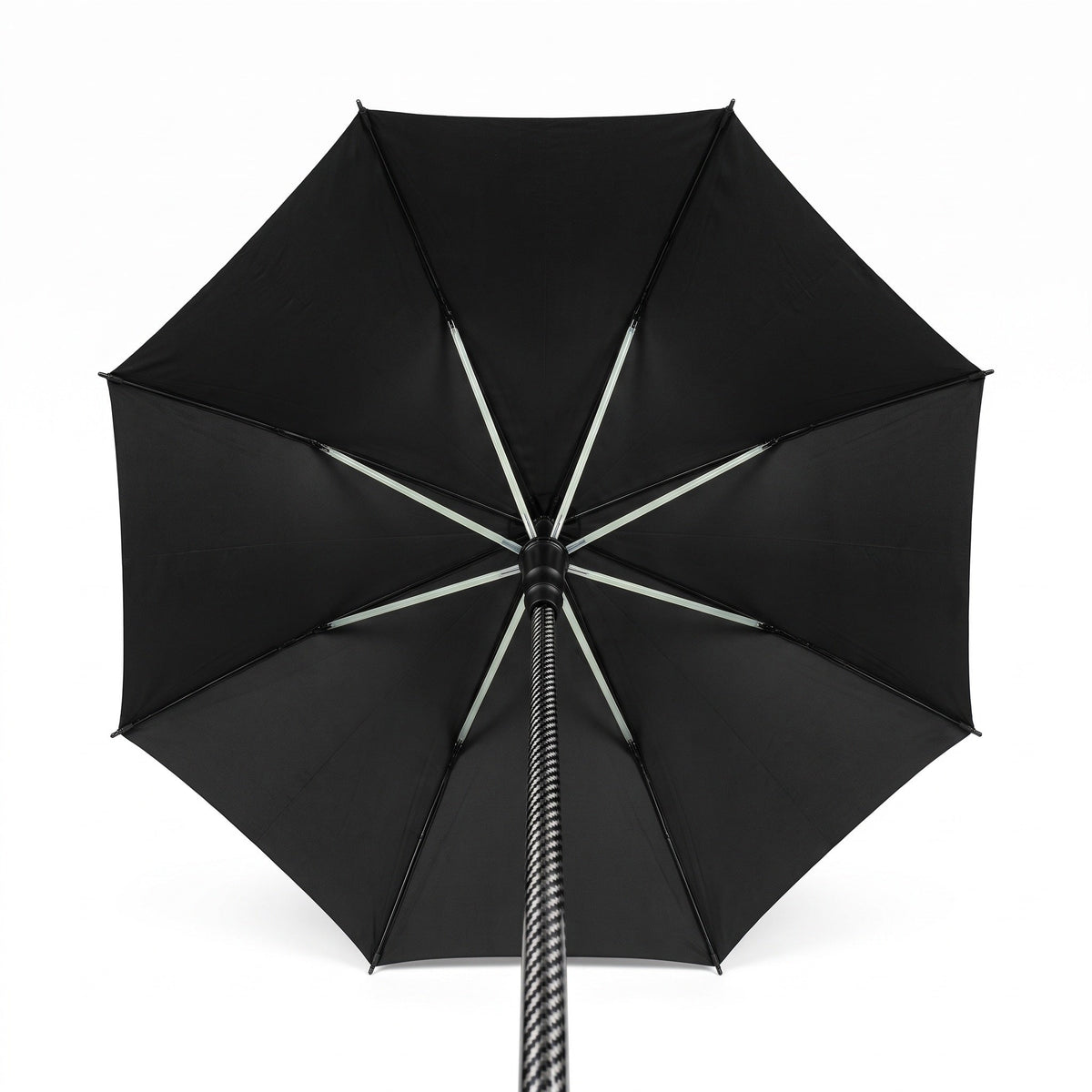 Underside of the open canopy showing eight ribs and the carbon shaft