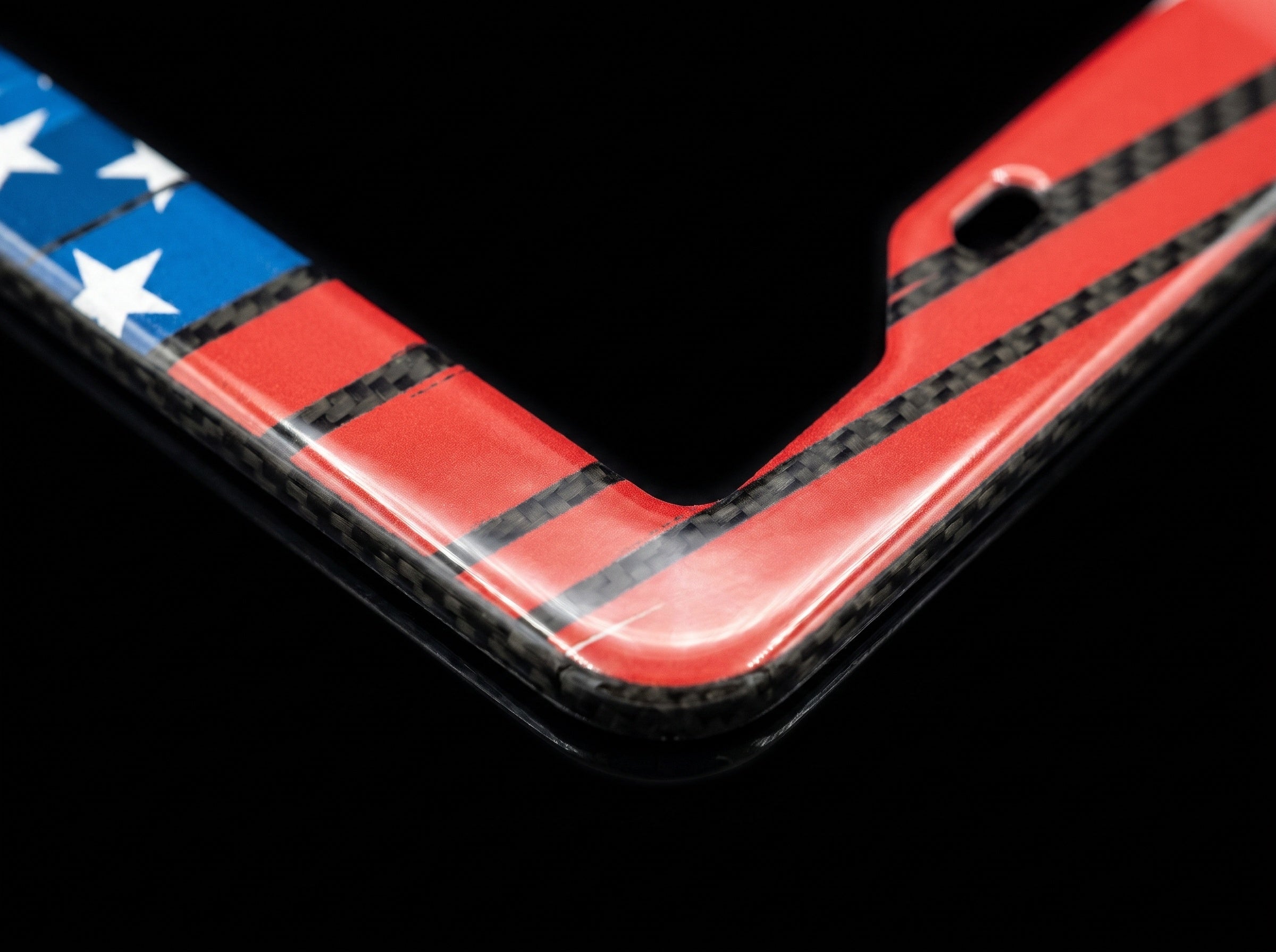 American flag carbon fiber license plate frame macro detail
