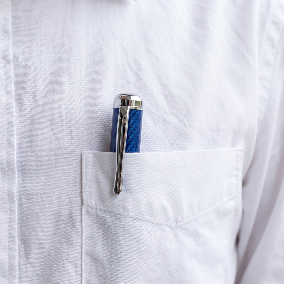 Blue CarbonInk clipped in a shirt pocket