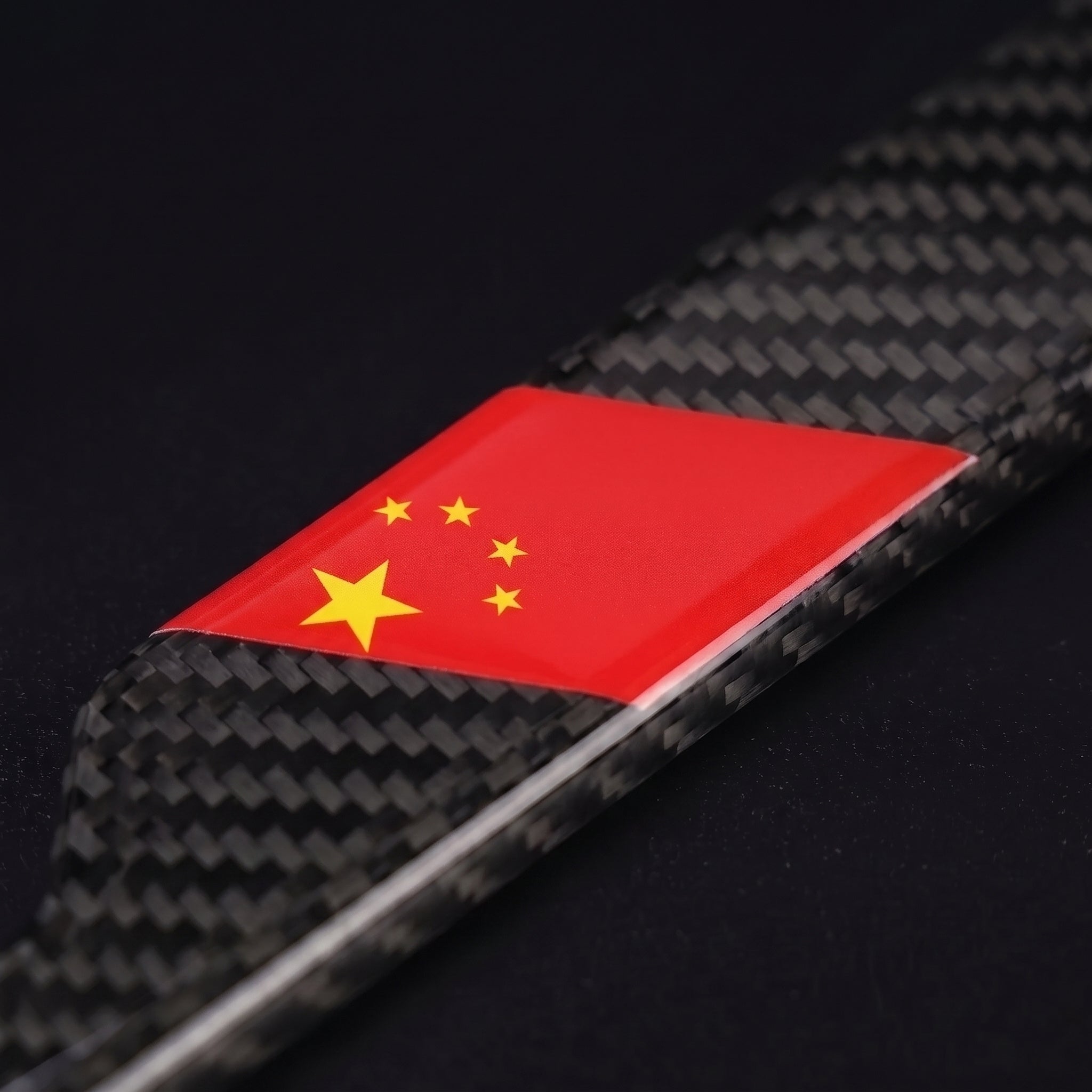 Macro of the China flag inlay on a PSF Carbon carbon fiber license plate frame