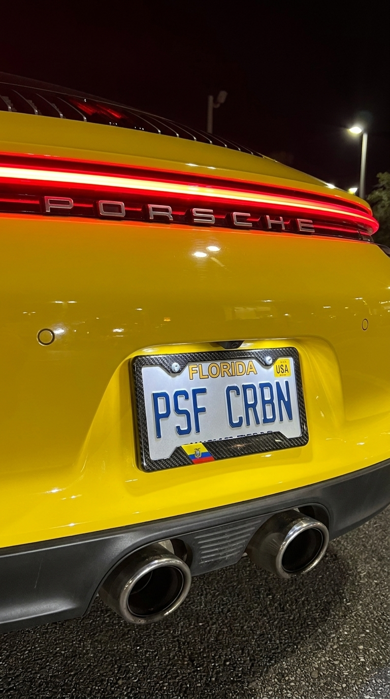 Ecuador carbon plate frame close-up on yellow Porsche 911