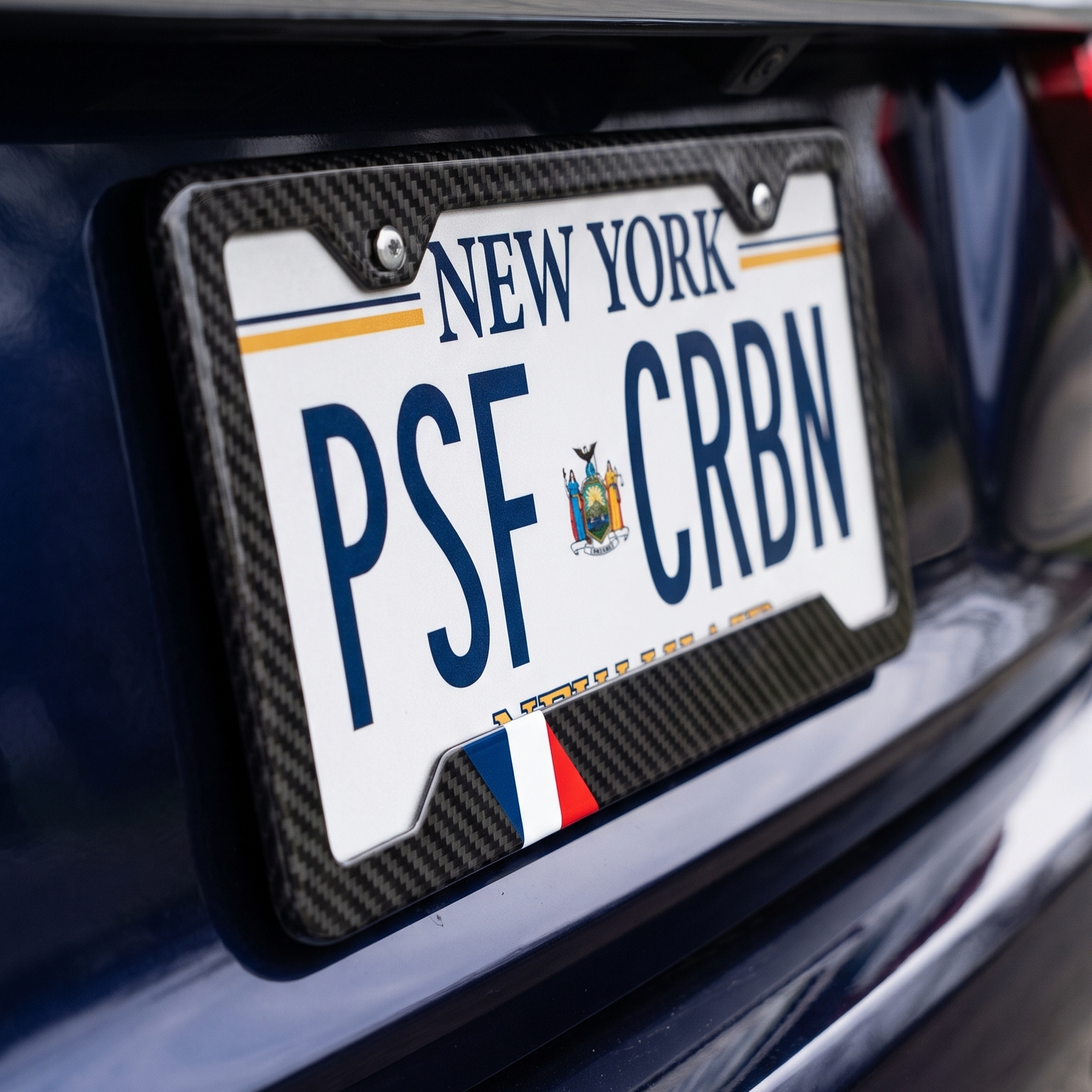 France flag carbon fiber license plate frame on BMW 7 Series, close-up, New York plate PSF CRBN