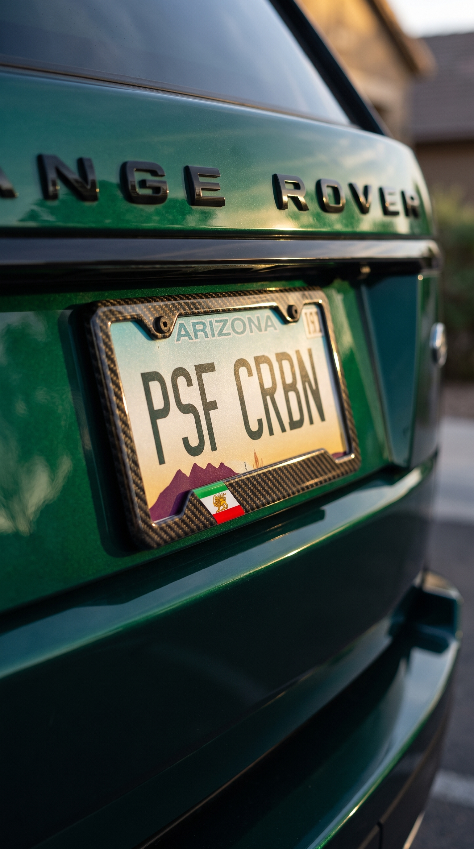 Iran flag carbon fiber license plate frame on Range Rover, three-quarter angle, Arizona plate PSF CRBN