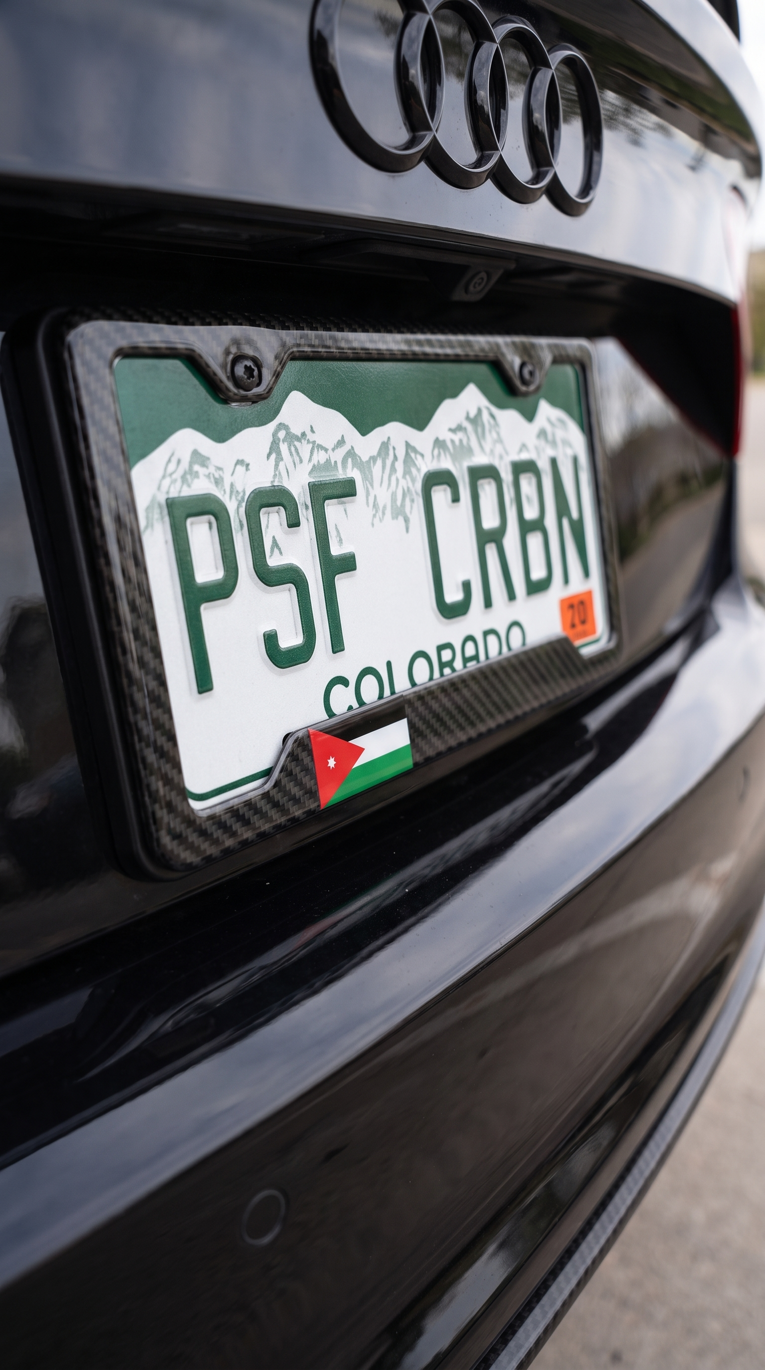 Jordan flag carbon fiber plate frame on gloss black Audi RS7