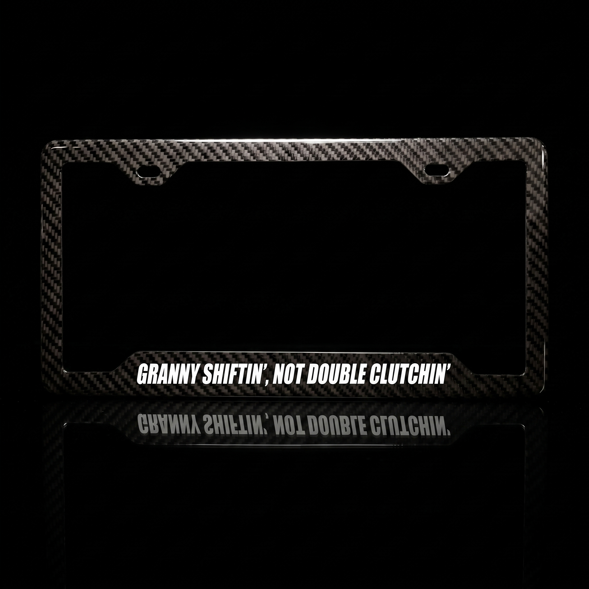 Granny Shiftin', Not Double Clutchin' carbon fiber license plate frame black studio shot
