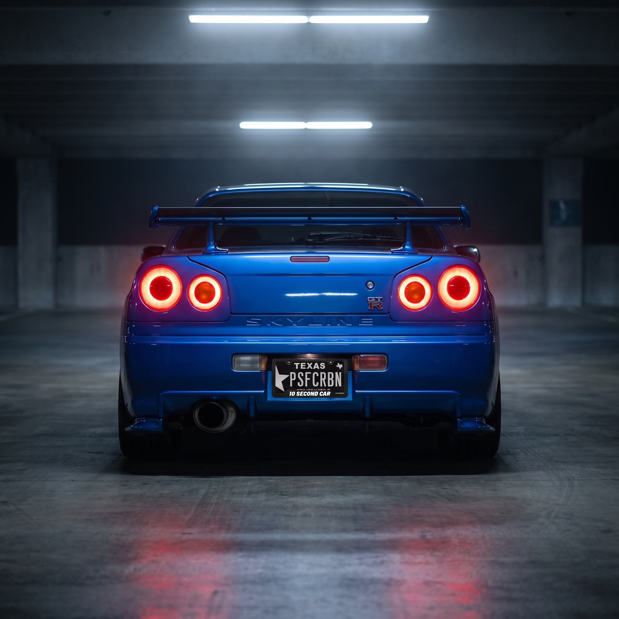 10 Second Car frame on a blue Nissan Skyline GT-R R34 in a night garage