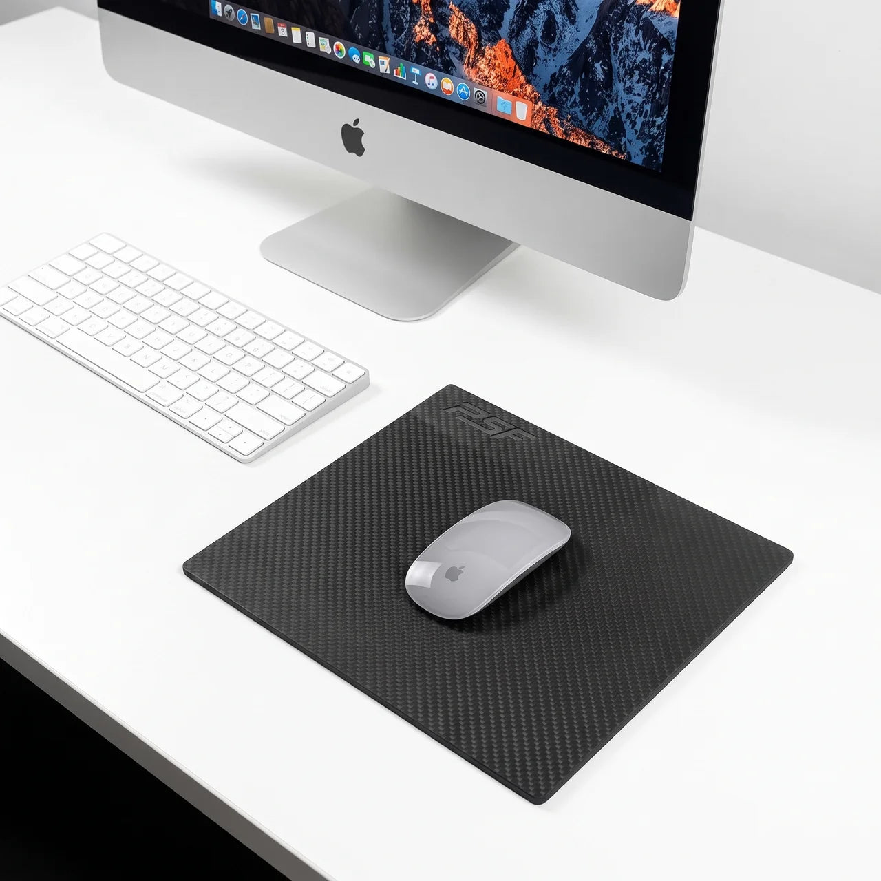 Clearcoated carbon fiber mousepad surface
