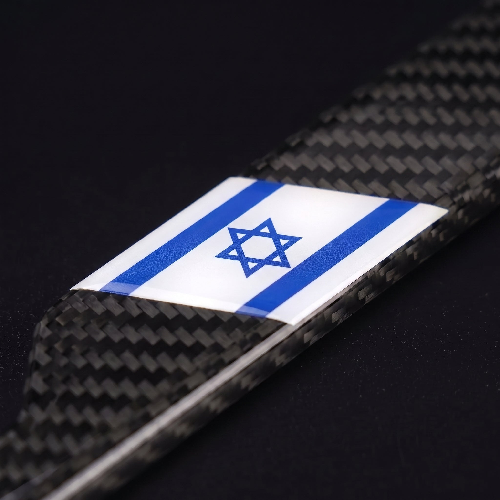 Macro of the Israel flag inlay on a PSF Carbon carbon fiber license plate frame