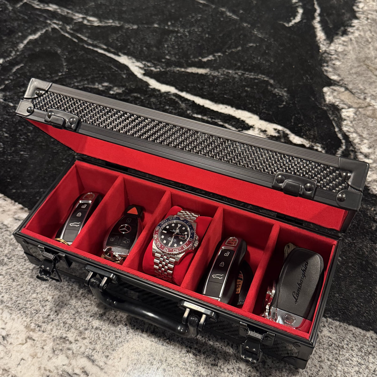 The Motorcase 5 Slot open with keys, red suede interior #Colour_Red